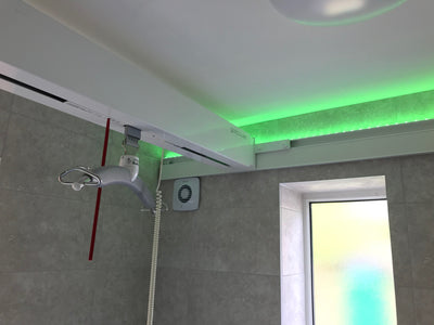 Utilising a fixed ceiling track hoist within a sensory bathroom
